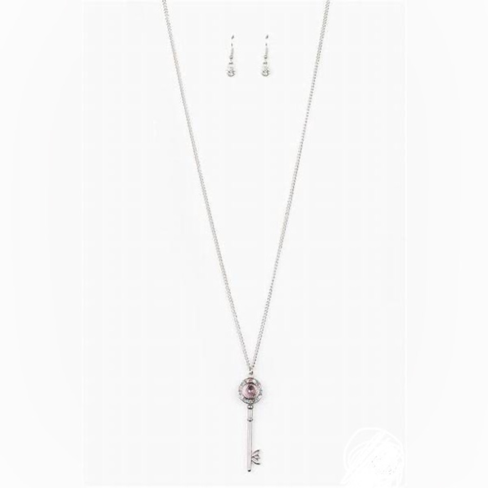*Long silver and multi colored rhinestones key pendant necklace.